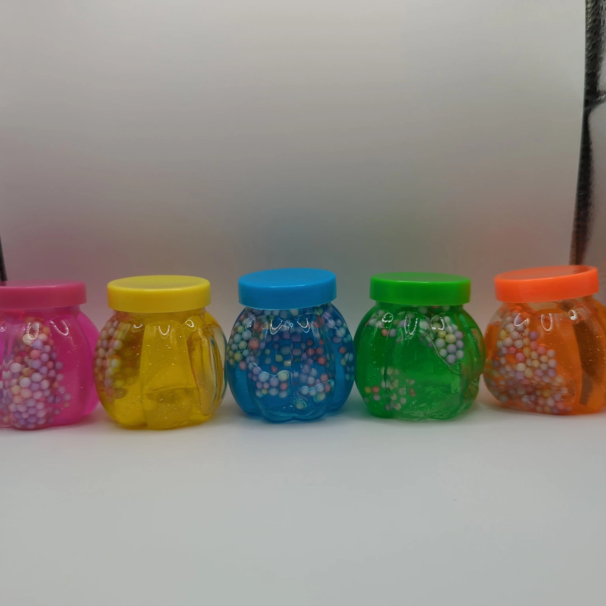 Small pots of putty with styrofoam - Fidgeting Fingers