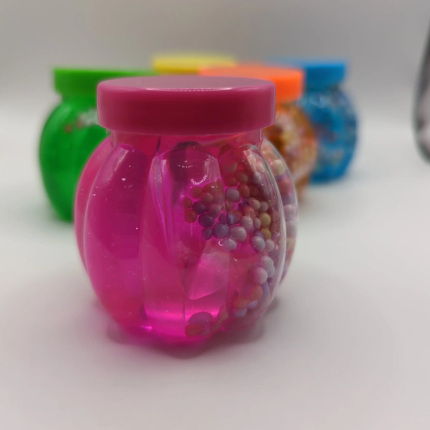 Small pots of putty with styrofoam - Fidgeting Fingers