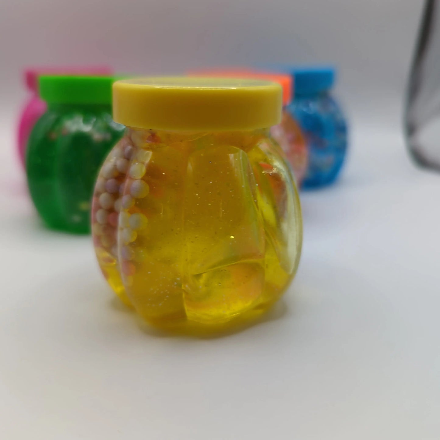 Small pots of putty with styrofoam - Fidgeting Fingers