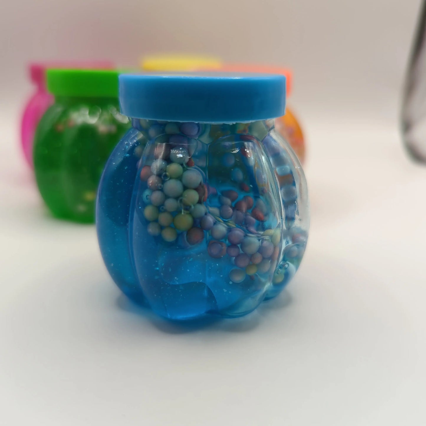 Small pots of putty with styrofoam - Fidgeting Fingers