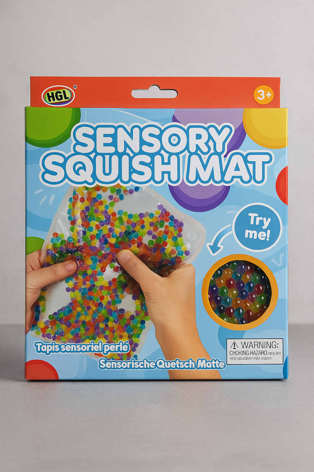 HGL Sensory Squish Mat front view with hands pressing beads”